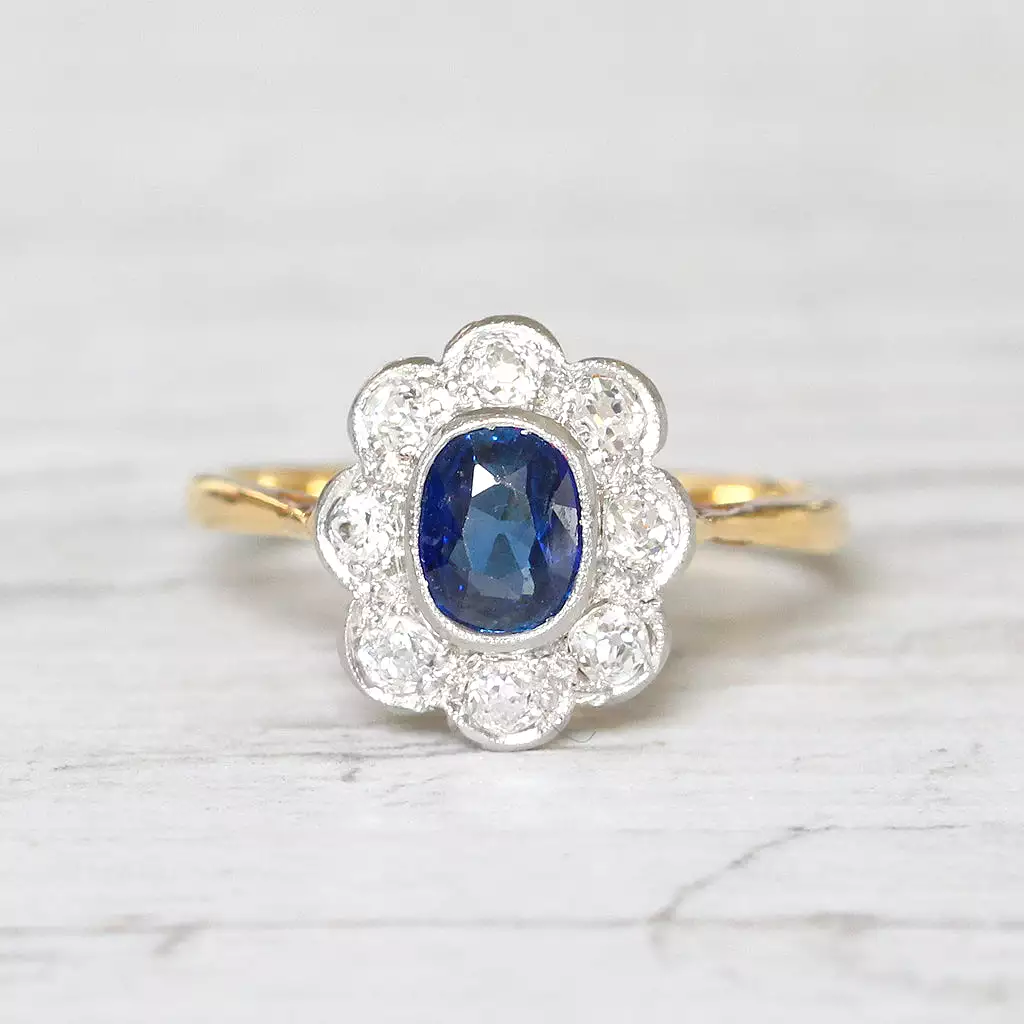 Edwardian 0.63 Carat Sapphire and Old Cut Diamond Cluster Ring