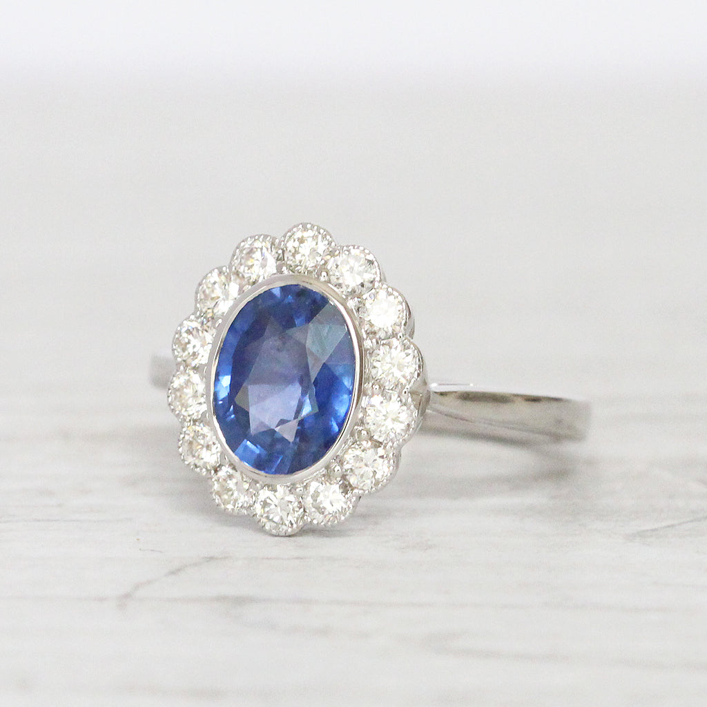 Vintage Style 2.29 Carat Sapphire and Diamond Oval Cluster